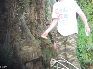 Нудисты по очереди купаются под водопадом